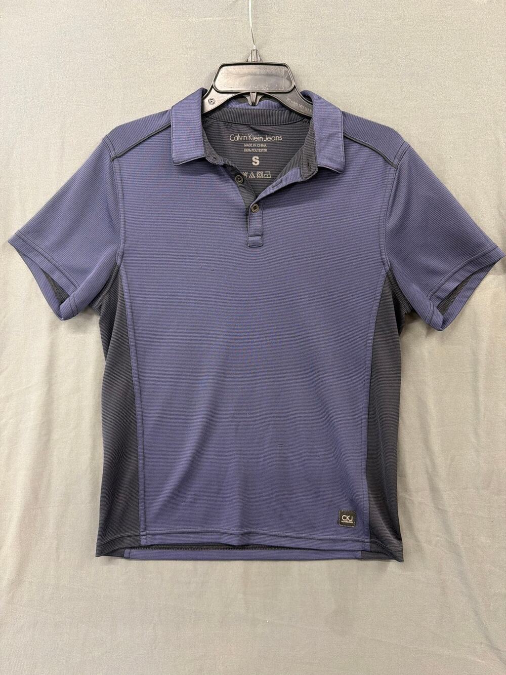 Calvin Kline jeans men’s small polo slight damage on back